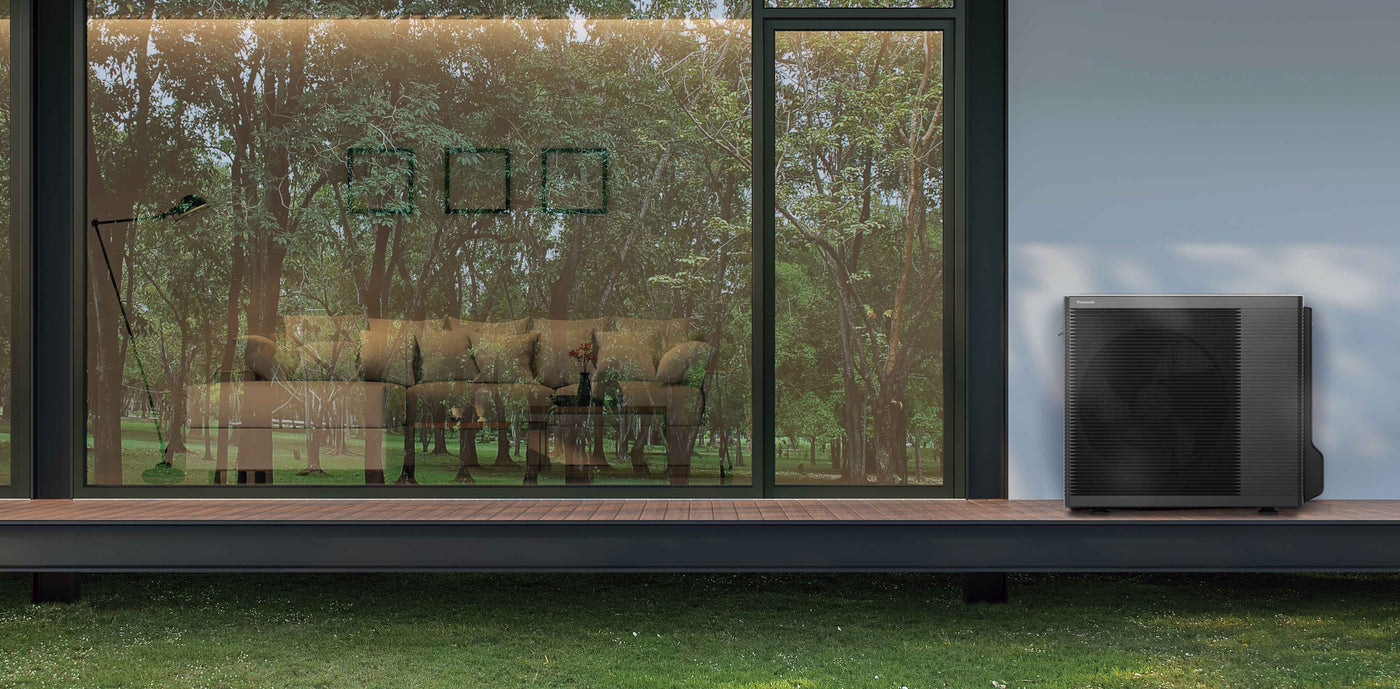 Et miljøbilde av en Panasonic luft-vann-varmepumpe